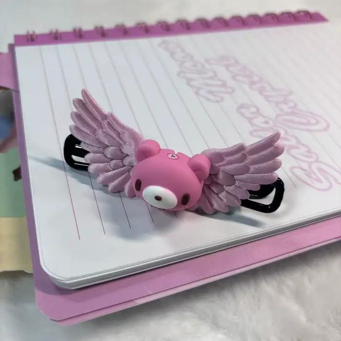Pinces à cheveux ours mignon avec ailes - Avec des designs d'ours rose et noir avec des ailes délica