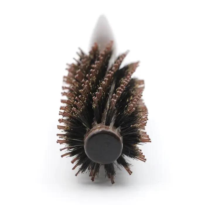 Brosse à rouler ronde avec manche en bois