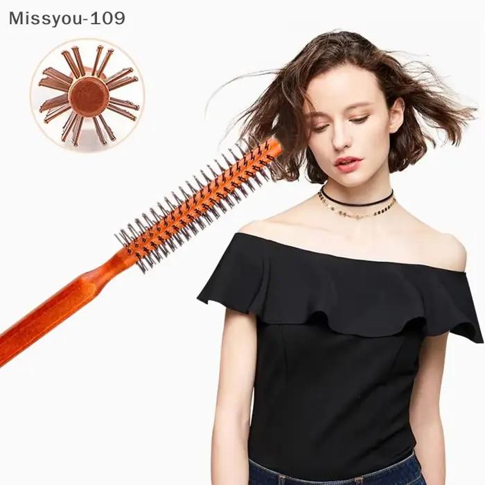 Peigne à cheveux bouclés en bois