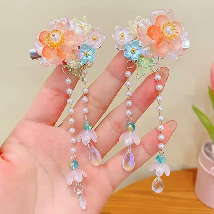Pince à cheveux rose tendance avec fleur et pompon
