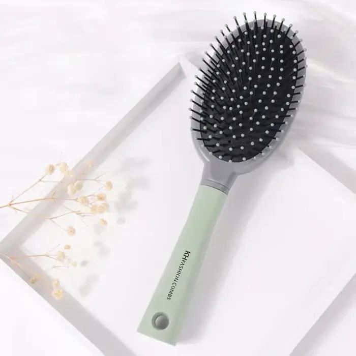 Brosse à cheveux démêlante pour cheveux ondulés/bouclés