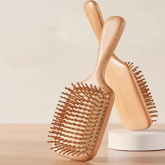 Brosse à cheveux en bois pour favoriser la croissance des cheveux