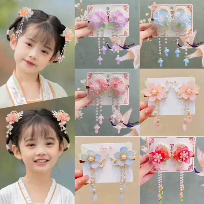 Pince à cheveux rose tendance avec fleur et pompon