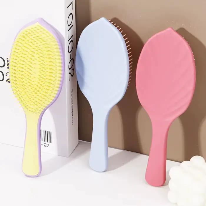Brosse à cheveux en forme de feuille moelleuse