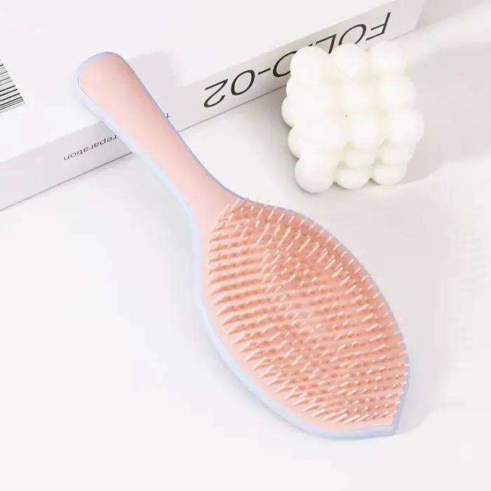 Brosse à cheveux en forme de feuille moelleuse
