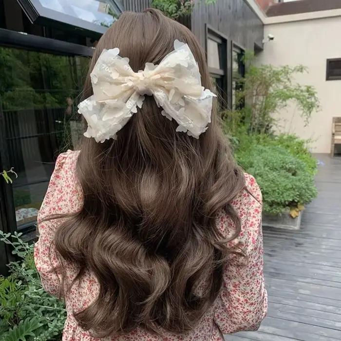 Grande pince à cheveux en tulle rose pour femmes