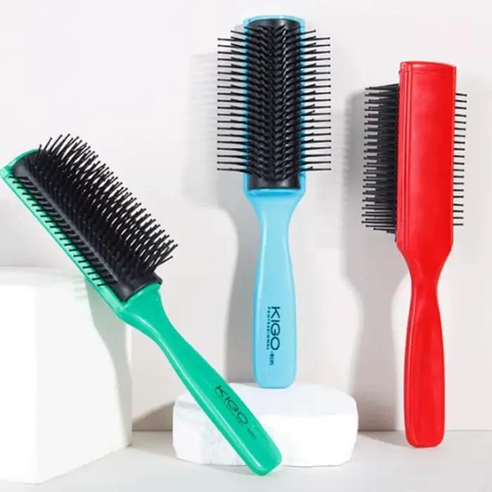 Brosse à cheveux ronde à 9 lignes légères pour lisse des performances anti-statiques pour le salon l'utilisation