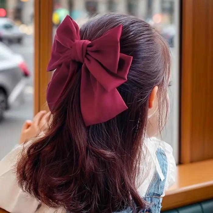 Pince à cheveux avec gros nœud rouge, petite fille, vent doux, 1