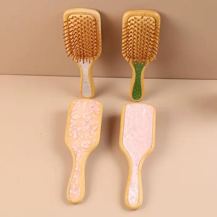 Brosse à cheveux antistatique démêlante avec coussin d'air