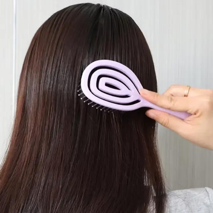 Brosse démêlante ventilée en spirale pour cheveux humides