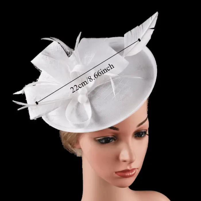 Chapeau fascinateur en plumes exquises