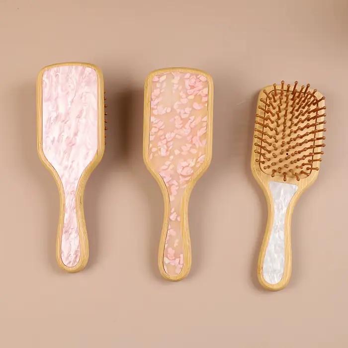Brosse à cheveux antistatique démêlante avec coussin d'air