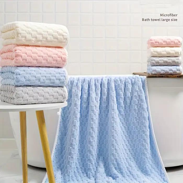 Une serviette de bain en tissu gaufré en microfibre ultra-absorbante