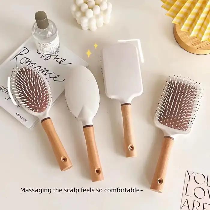 Brosse à cheveux à palette pour cheveux longs