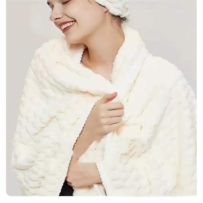 Une serviette de bain en tissu gaufré en microfibre ultra-absorbante