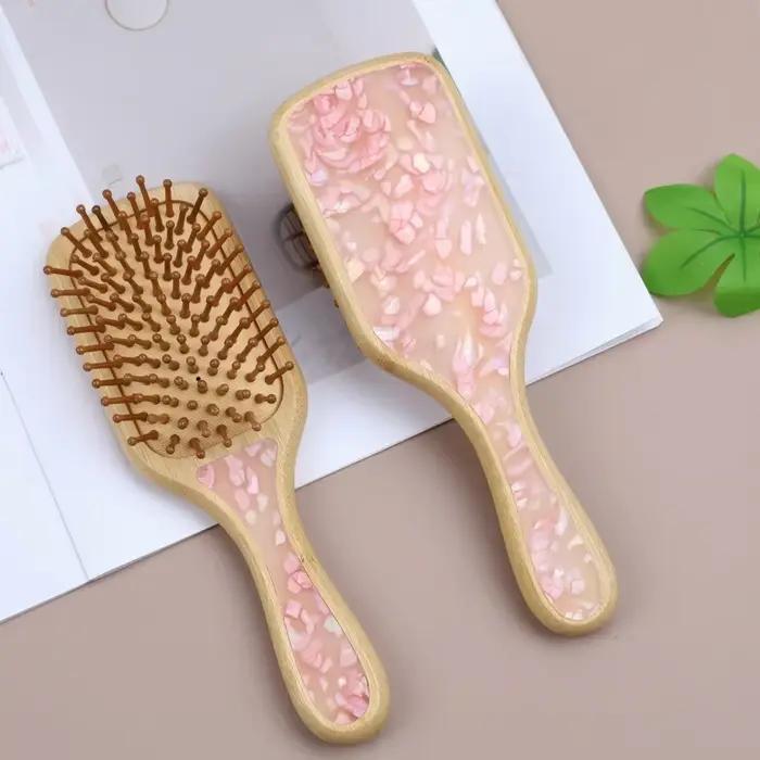 Brosse à cheveux antistatique démêlante avec coussin d'air