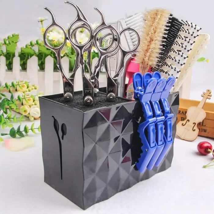Boîte de rangement pour outils de coiffure